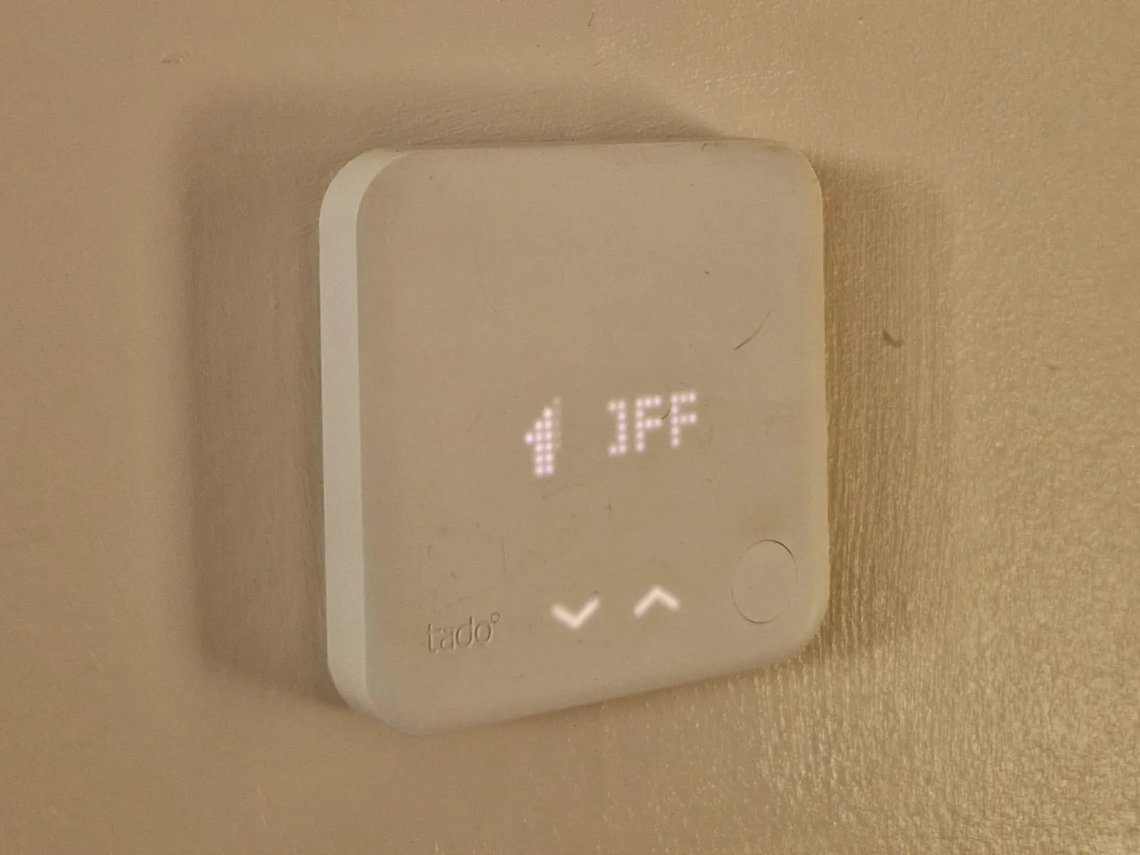 tado° Wired Smart Thermostat fitted on the living room wall of a Castlereagh, Belfast home